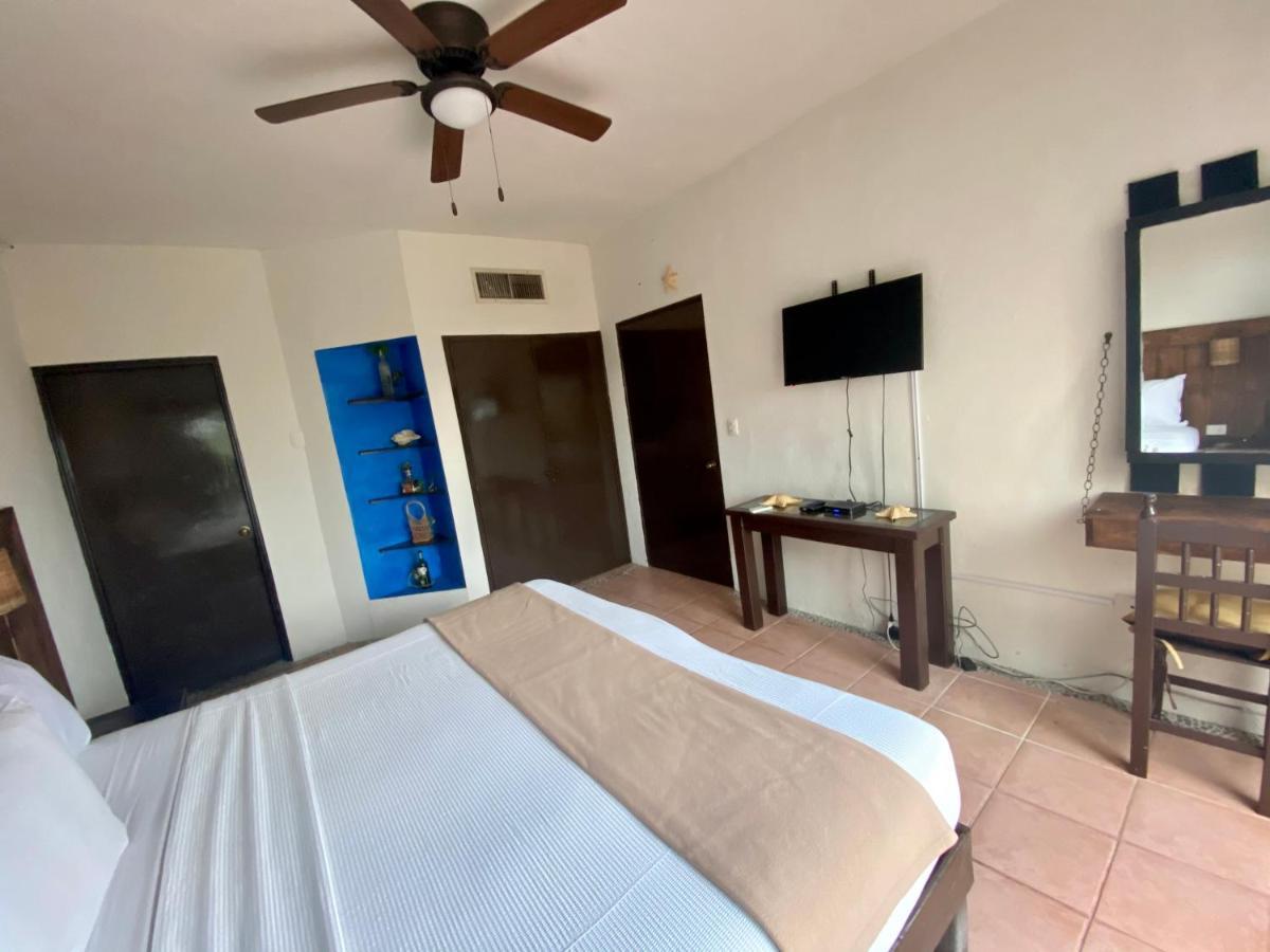 Casa Caribe Cancún Exterior foto A bedroom at the hotel