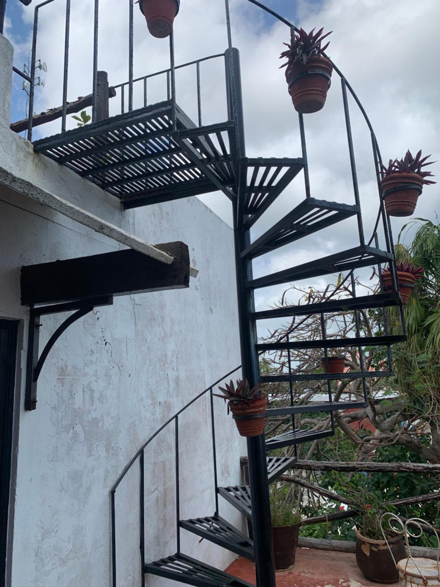 Casa Caribe Cancún Exterior foto Spiral staircase